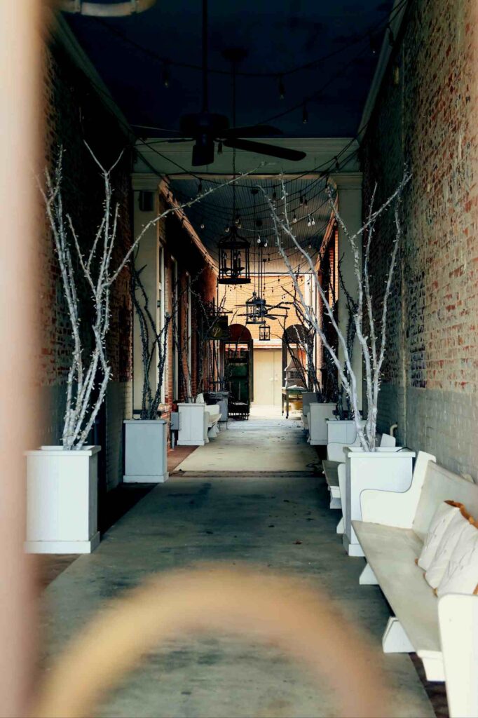 A brick alleyway in Ruston, Louisiana, with beautiful architectural details.